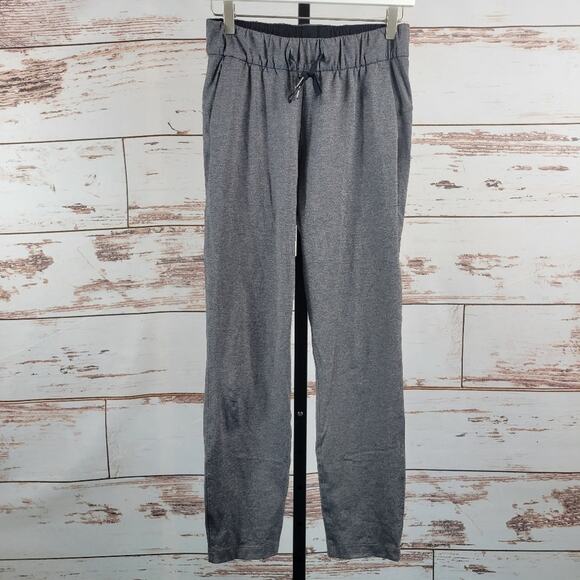 Lululemon On The Fly Pant 28" Heathered Black 4 - Picture 1 of 6